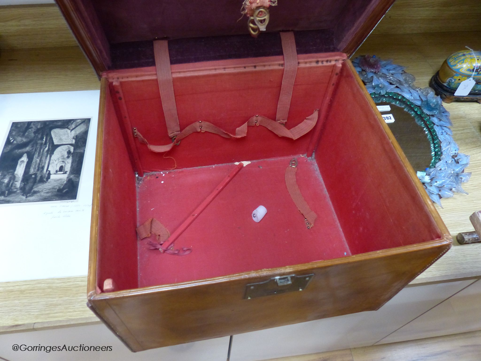 A brown hide travelling case